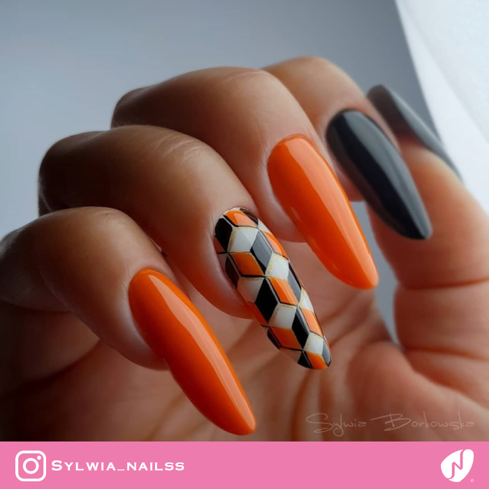 Black and Orange Geometric Nails